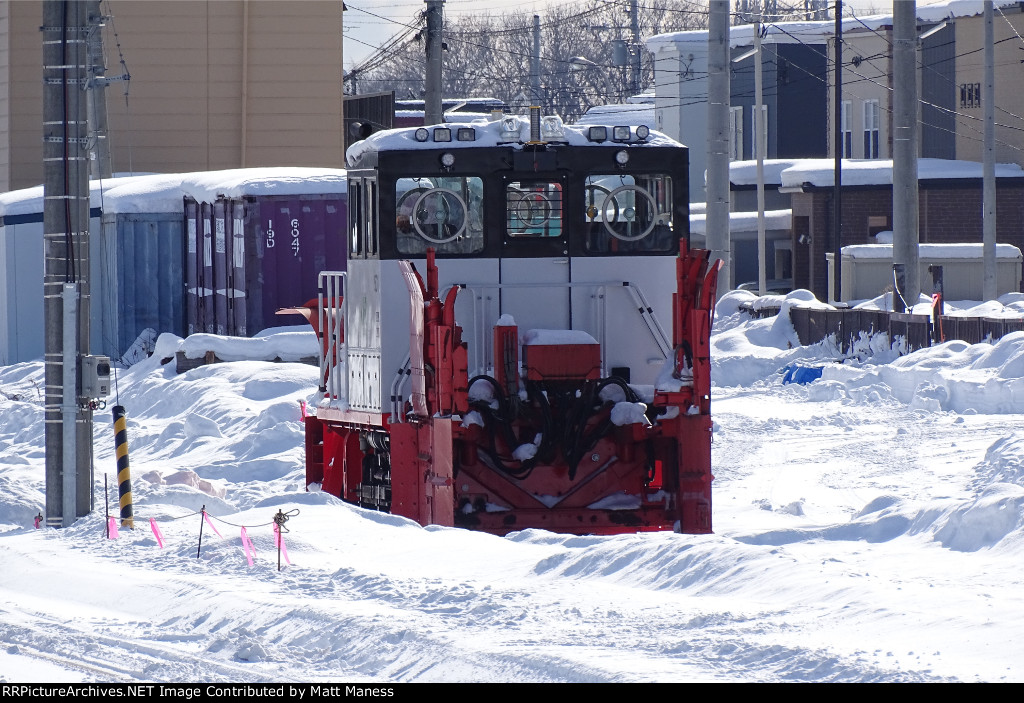 Snow Plow parked on the siding